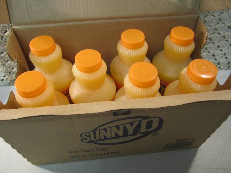 lot 144 image: Lot of 7 Bottles Tangy Original Sun...
