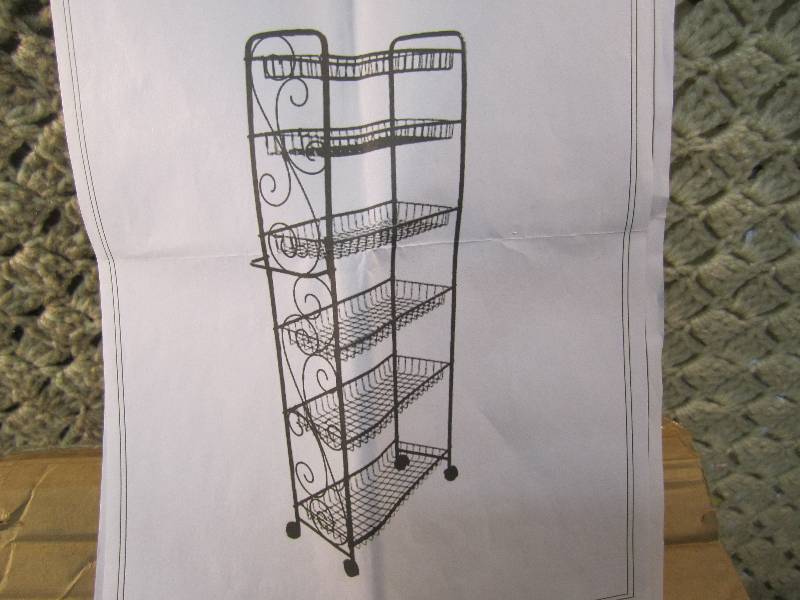 lot 170 image: Red Metal Scroll Rolling Pantry Ope...