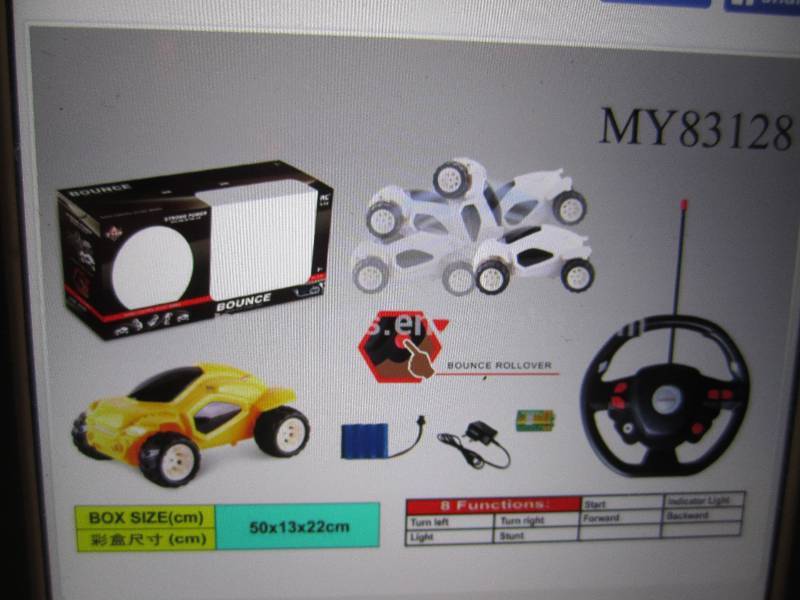 lot 302 image: Bounce Back Flip Stunt RC Car in R...
