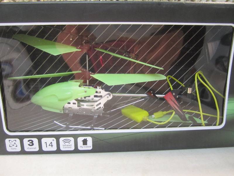 lot 311 image: Thumbs Up Glow In The Dark RC Helic...