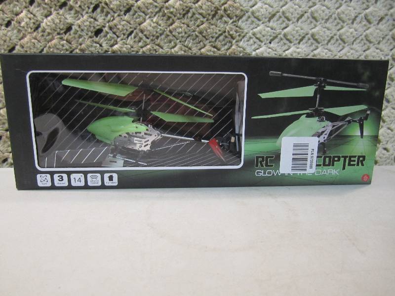 lot 312 image: Thumbs Up Glow In The Dark RC Helic...