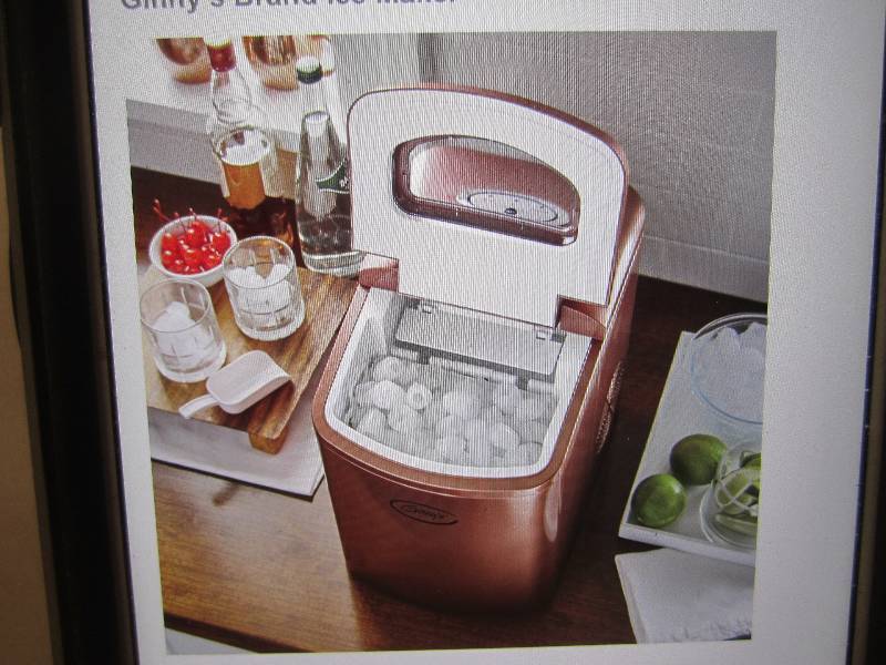 lot 316 image: Ginnys Brand Ice Maker in the colo...