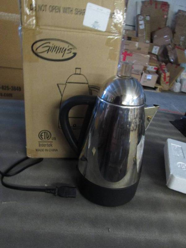 lot 75 image: Ginnys Coffee Pot open box, powers...