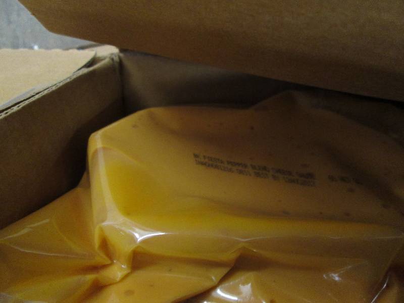 lot 162 image: Case of Fiesta Pepper Blend Cheese ...