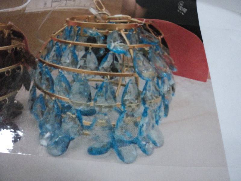 Swag light with blue prisms...