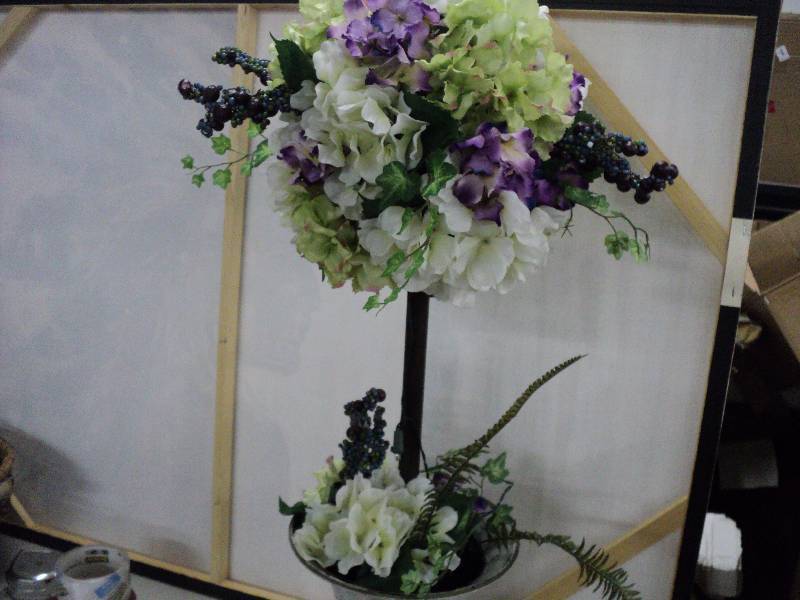 artificial plant in grey urn...