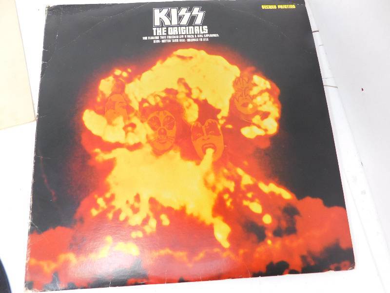 lot 1 image: KISS The Originals Album and Kiss Collectibles Price Guide Book