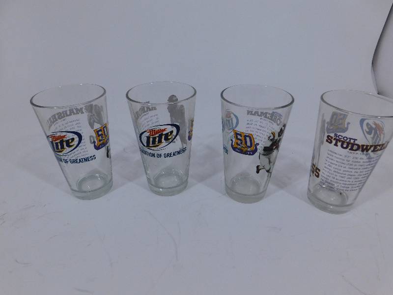 lot 17 image: 4 Miller Lite Vikings Glasses
