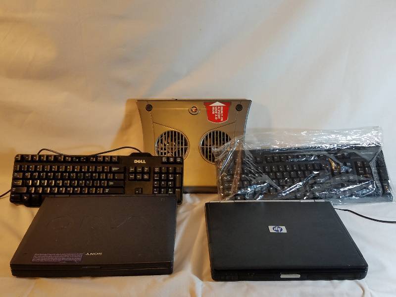 LAP TOP COMPUTERS WITH FANS AND KEYBOARDS