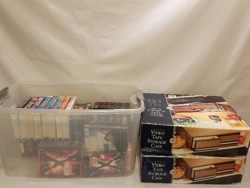 VHS VIDEOS AND STORAGE CASES
