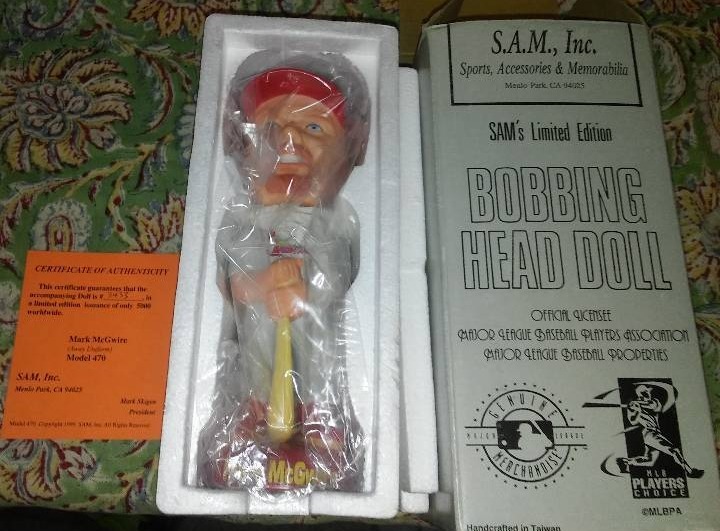 lot 8 image: Mark McGwire, COA . Bobbing Head Doll