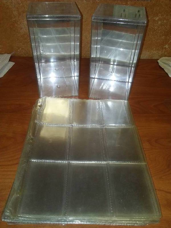 lot 63 image: 2 mirrored Acrylic boxes, 25 pages.