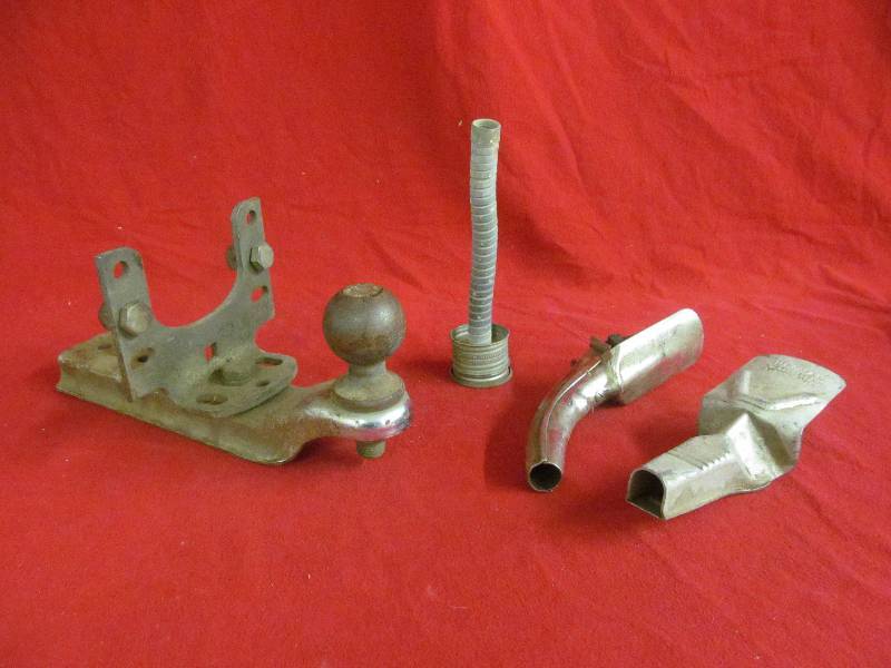 lot 73 image: Vintage oil spouts, trailer hitch