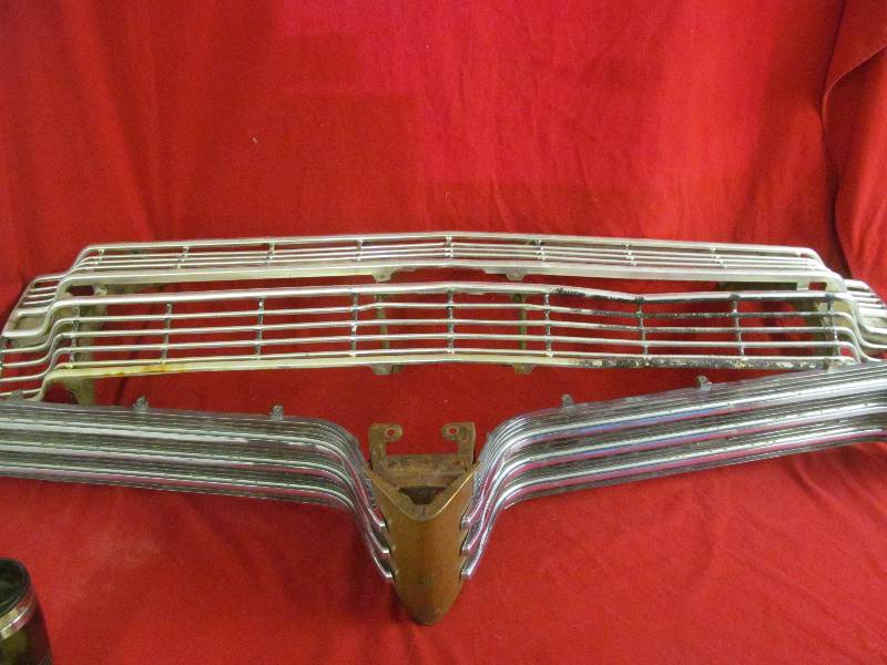 lot 92 image: vintage Ford grill, Pontiac grill