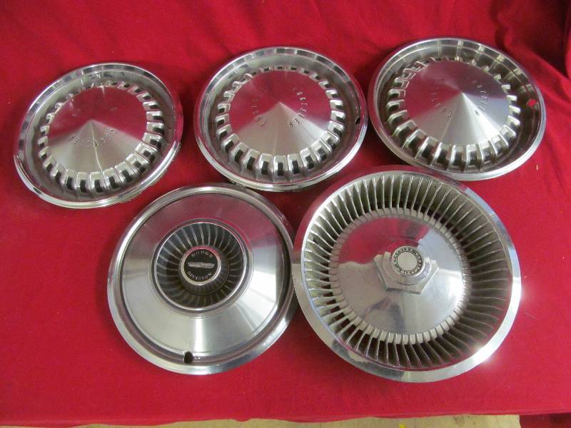 lot 104 image: vintage hubcaps
