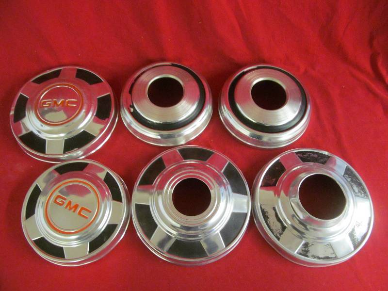 lot 106 image: vintage GM hub caps