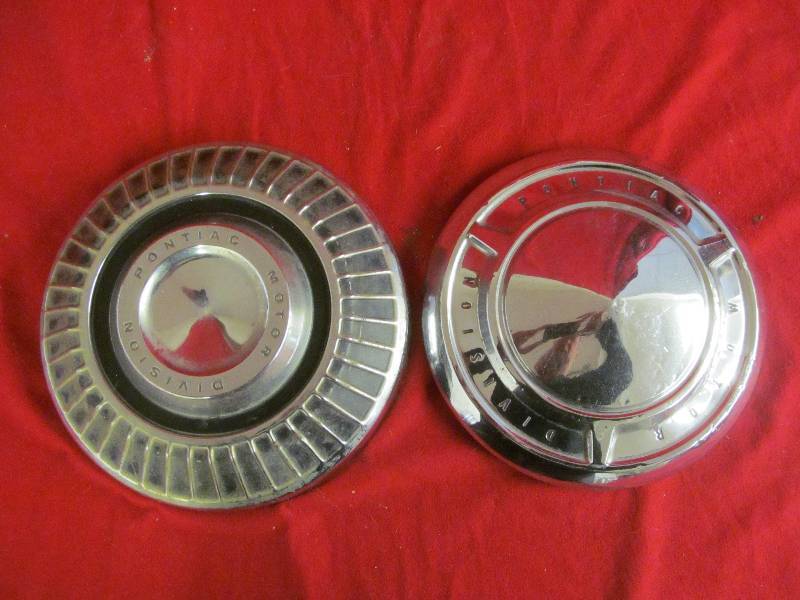 lot 109 image: vintage Pontiac hub caps