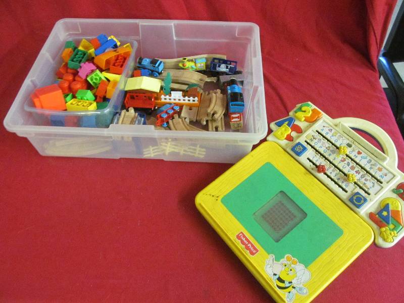 lot 129 image: Fisher price learning tool, Legos, Thomas the train