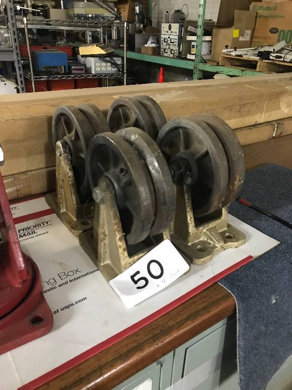 lot 50 image: 4 FIXED RAIL CASTERS