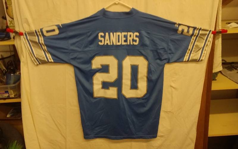 lot 11 image: # 20 Lions Barry Sanders Rebok Throwbacks Size XL
