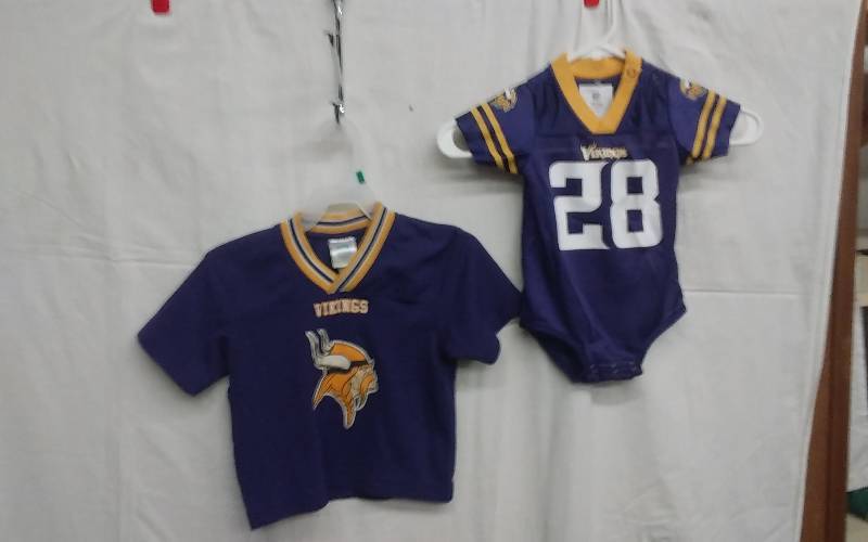 lot 15 image: #28 Vikings Peterson Onesie Size 6-9 Mo. & Little Jersey Size 4