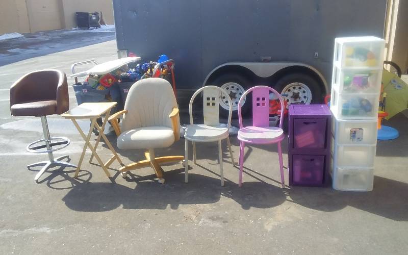 lot 62 image: Large Lot Of Assorted Chairs, 1-Bar Stool, TV Tray, & Bin With Toiletries & Cleaning Supplies