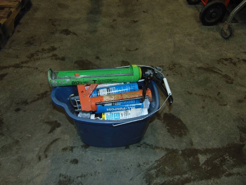 Assortment of Calking Tubes and Gun