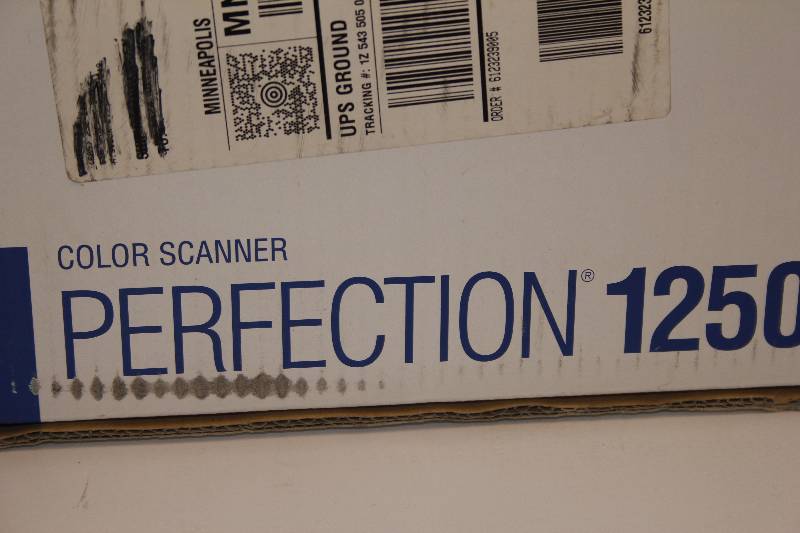 lot 49 image: Epson Professional photo scanner.comes still in the box comes with everything