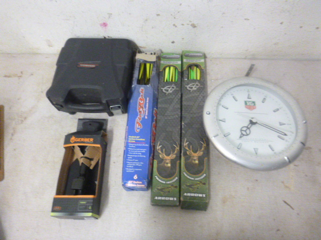 Clock, Arrows, Folding Shovel