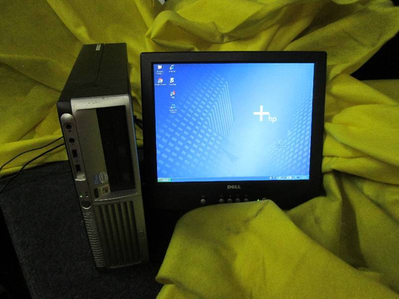 lot 176 image: HP Compaq computer loaded with Wind...