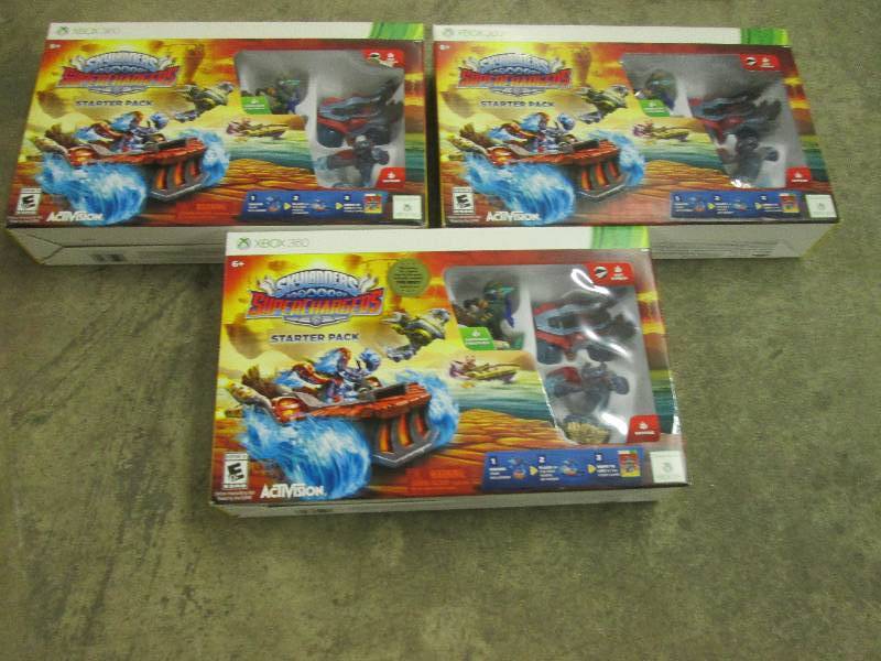 lot 197 image: 3 Xbox 360 skylander starterpacks...