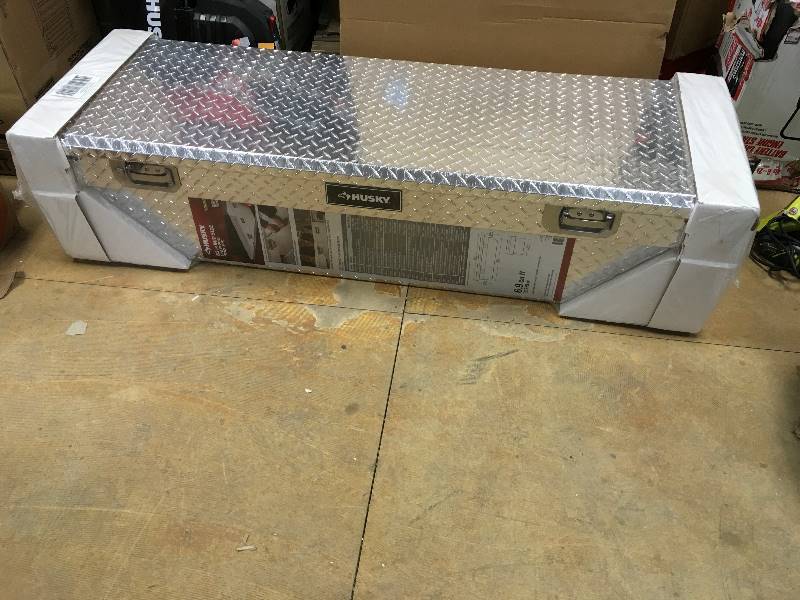 Husky 62in Mid Size low profile truck box in good condition