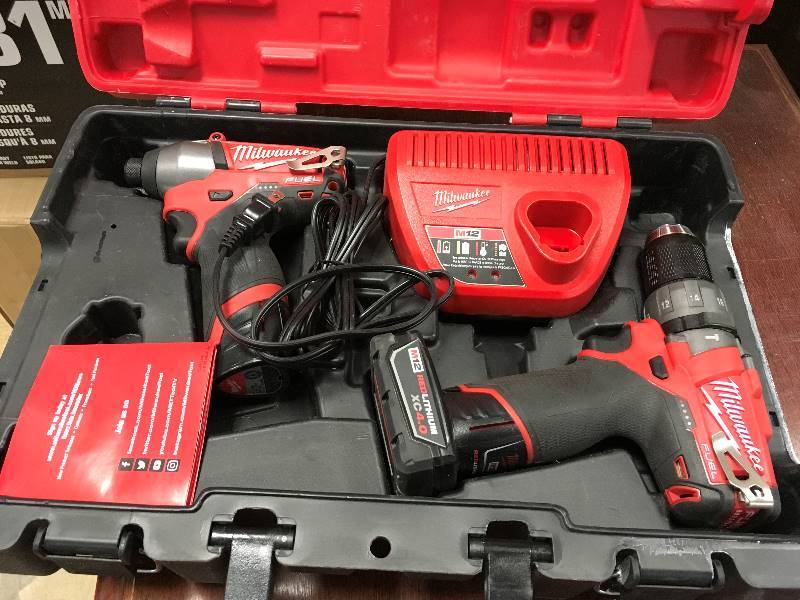 Milwaukee M12 FUEL 12-Volt Lithium-Ion Brushless Cordless 12in. Hammer DrillDriver and Impact Combo Kit w(2) Batteries, Charger in good condition