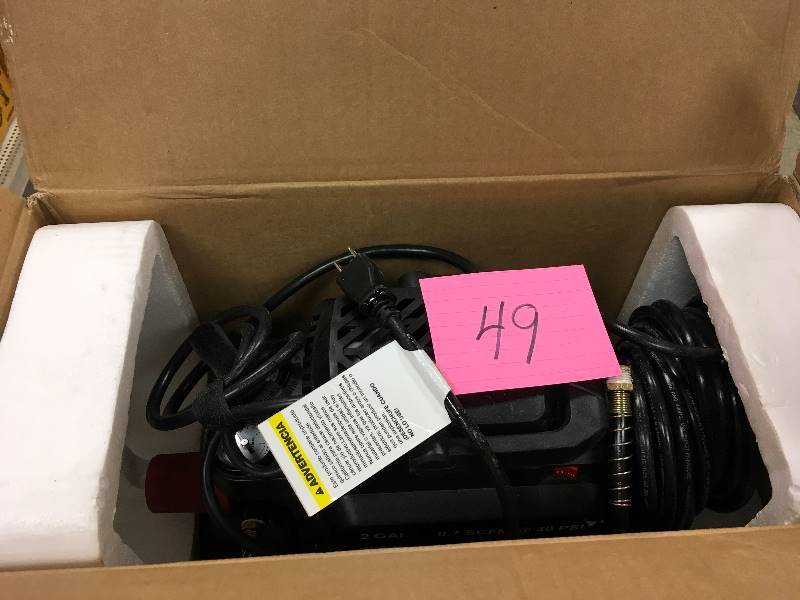 Husky 2 Gallon Oil-Free Air Compressor in working onditions