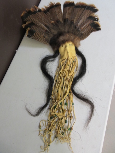 lot 136 image: FEATHERED AND LEATHER WALL HANGING