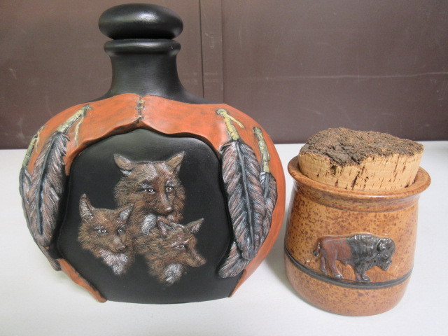 lot 366 image: BUFFALO POT AND WOLF BOTTLE