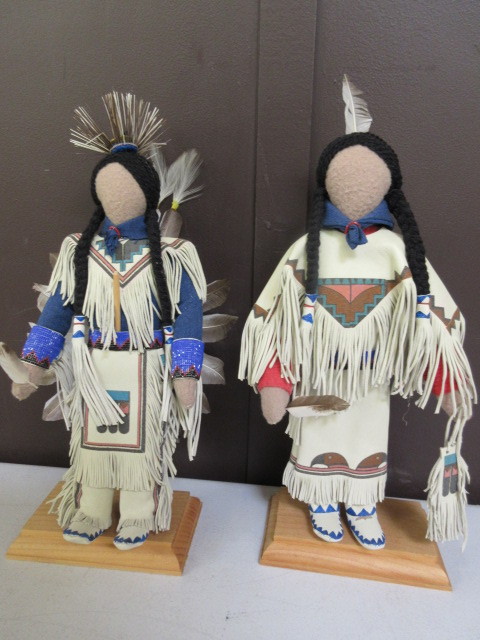 lot 445 image: RAWHIDE DECORATED DOLLS
