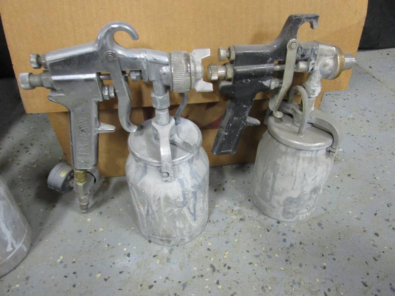 lot 30 image: (3) Paint Guns, Air Hood, Box of Masks