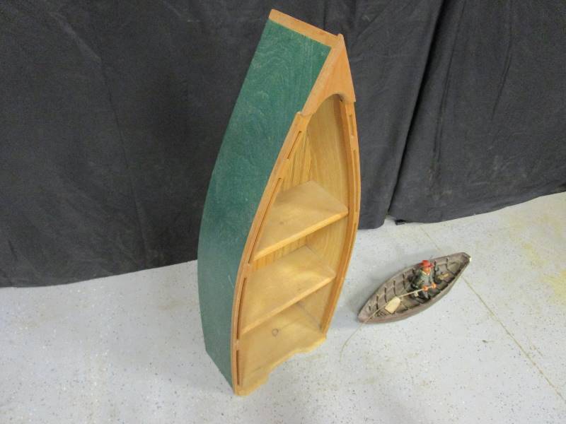lot 101 image: Canoe Shelf Unit & Fishing Decor