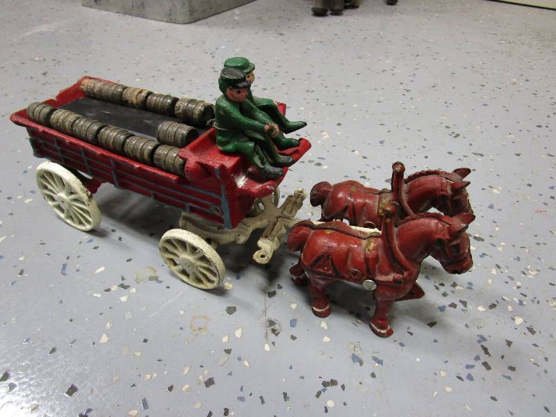 lot 106 image: Vintage Cast Iron Beer Wagon & Coke Wagon