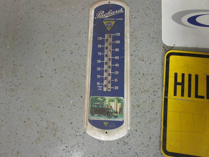lot 116 image: Road Signs & Tin Packard Thermometer