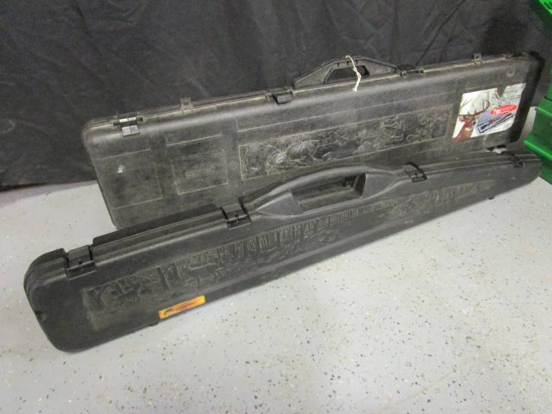 lot 124 image: (2) Hard Plastic Gun Cases (4) Bullet Cases