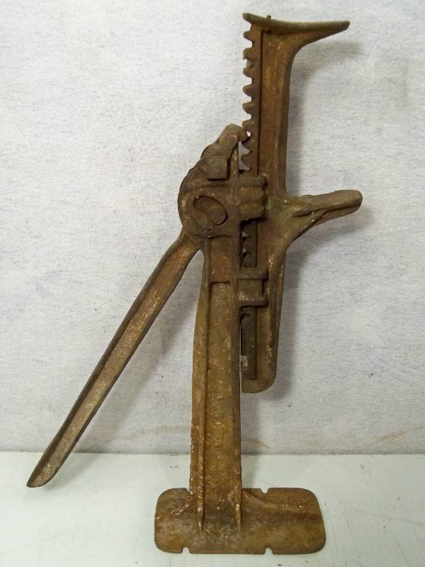 lot 114 image: Antique Car Jacks