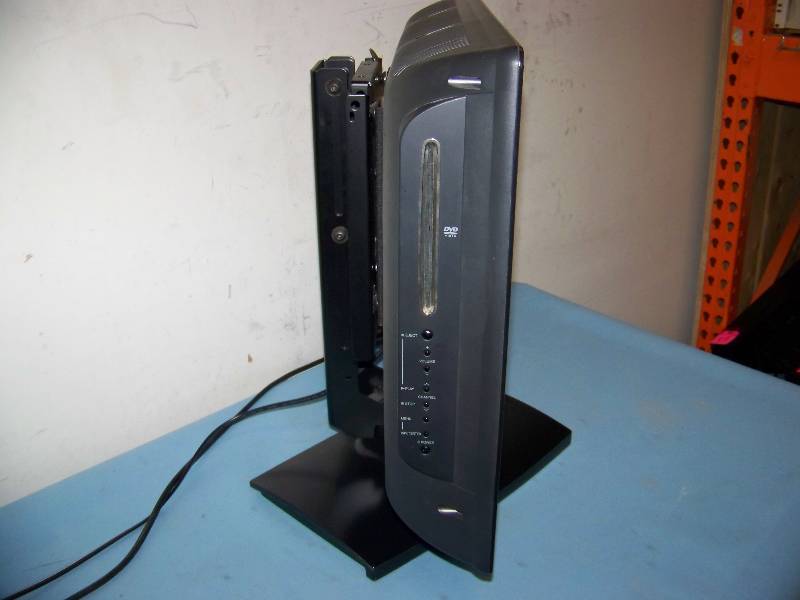 lot 26 image: Toshiba LCD HDTV  DVD Combination Television DVD Player & Stand