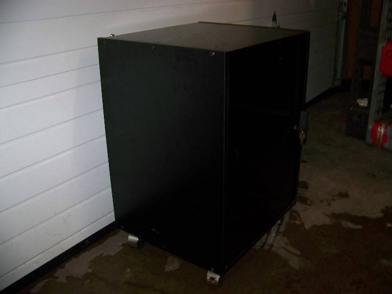 lot 84 image: Wood Encased, Audio  Video Equipment  Component Rack with Smoked Glass Door with Lock and Keys on Wheels