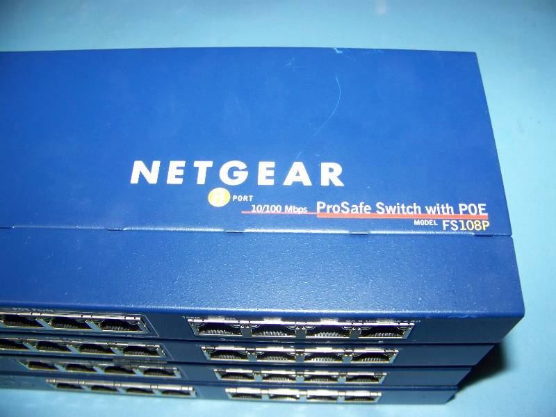 lot 100 image: (4) NetGear, ProSafe, 8-Port, Fast Ethernet Switches