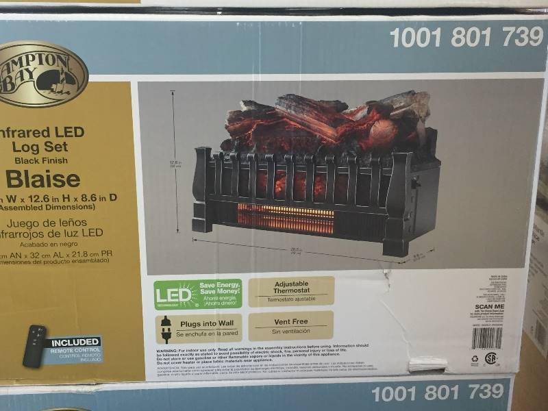 lot 25 image: BRAND NEW in box 23 in. Electric Log Set with Heater