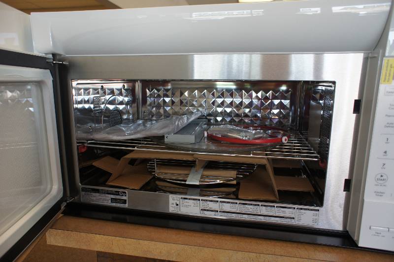 lot 20 image: BRAND NEW, SCRATCH AND DENT Kenmore Elite Model # (79080372310) -  80372 1.8 cu. ft. Over-the-Range Convection Microwave - White Color -  MSRP $ 599.99