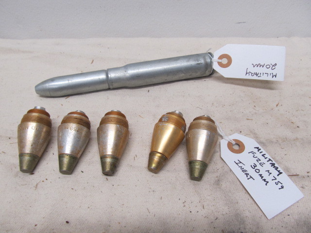 lot 16 image: Vintage Military Inert Fuses & 20mm shell
