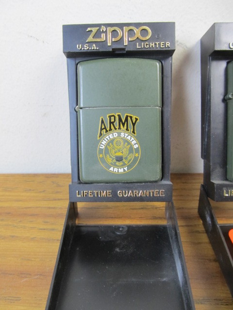lot 158 image: Group of 3 Military Zippo Lighters wCases